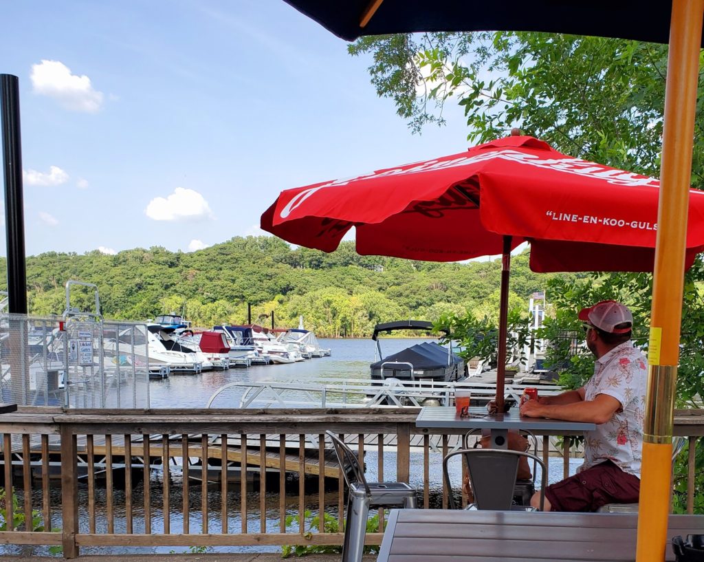 PD Pappy's outdoor dining deck next to the St. Croix River and boat marina