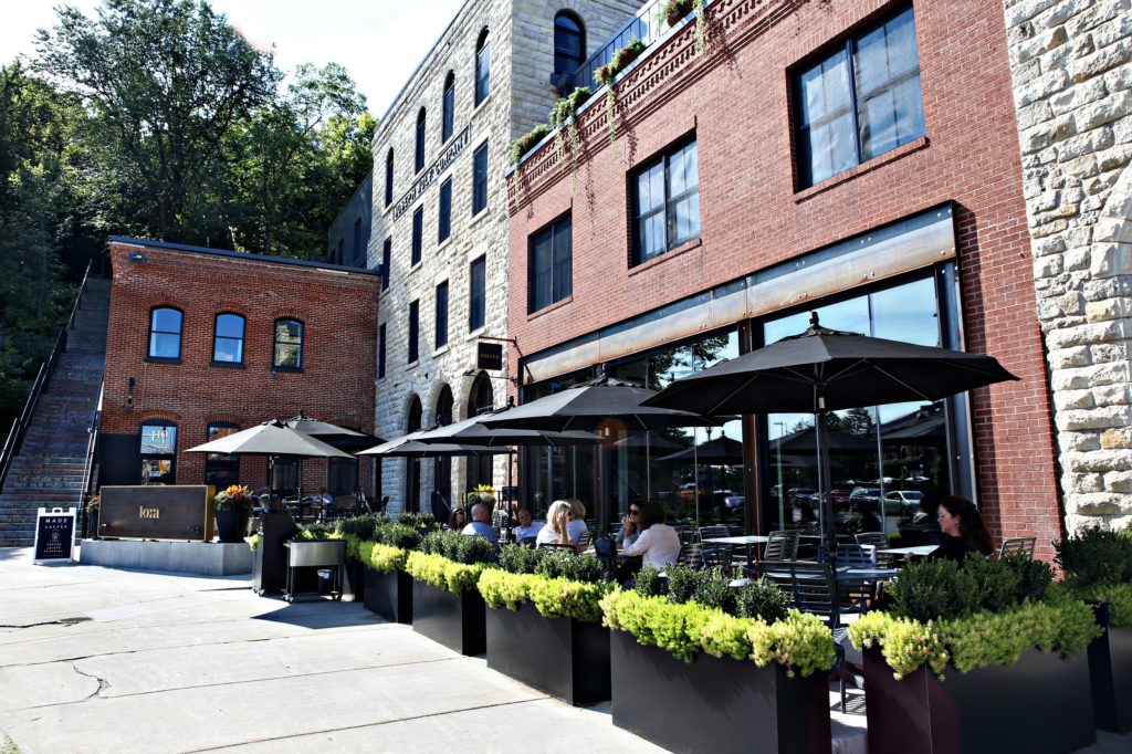 Main Street outdoor dining patio for Feller Restaurant in Lora Hotel which is adjacent to the historic main street stairs